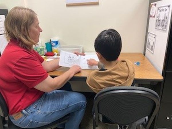 student reading with Early Steps tutor